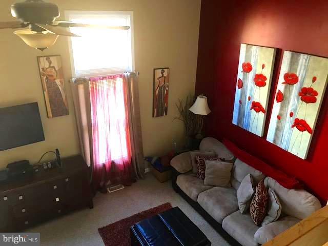 9202 Oregold Court Laurel, MD 20708 - Photo 13 of 29 a living room with furniture and a window