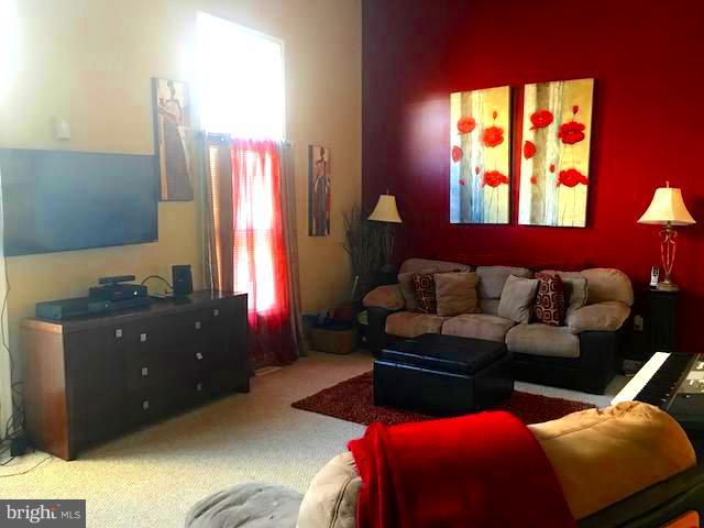 9202 Oregold Court Laurel, MD 20708 - Photo 14 of 29 a living room with furniture and a window