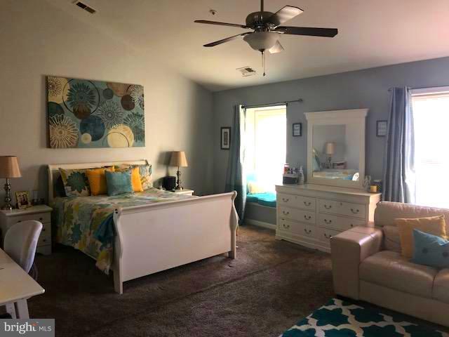 9202 Oregold Court Laurel, MD 20708 - Photo 19 of 29 a living room with furniture and a window