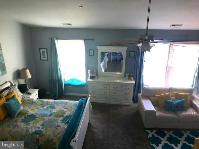 9202 Oregold Court Laurel, MD 20708 - Photo 21 of 29 a bedroom with furniture and a window