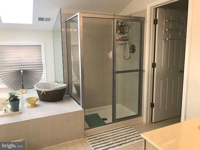 9202 Oregold Court Laurel, MD 20708 - Photo 23 of 29 a bathroom with a shower and a sink