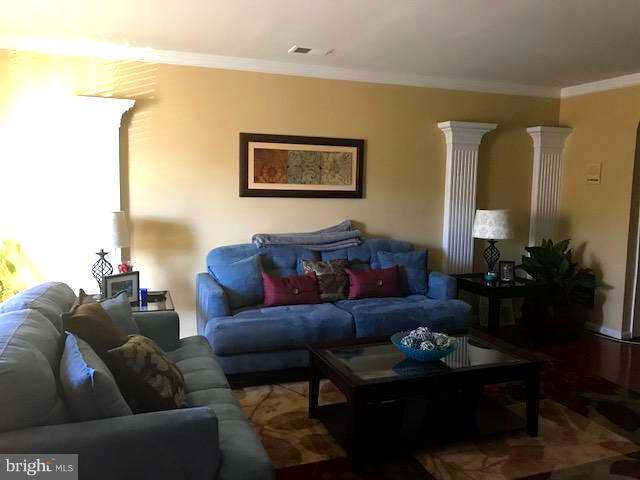 9202 Oregold Court Laurel, MD 20708 - Photo 4 of 29 a living room with furniture and a table