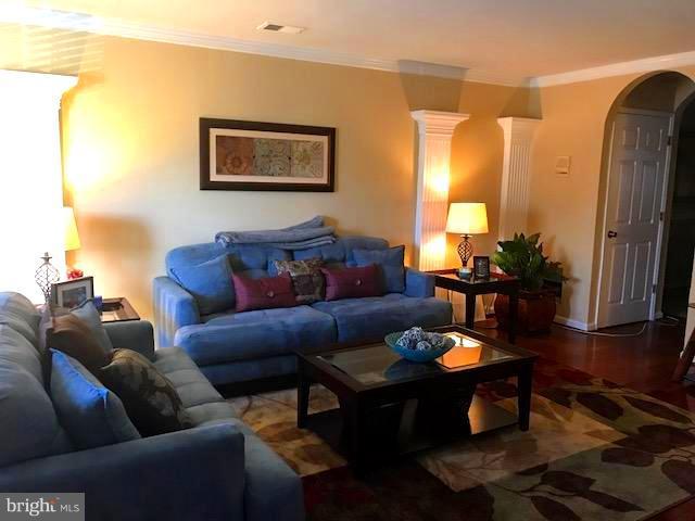 9202 Oregold Court Laurel, MD 20708 - Photo 5 of 29 a living room with furniture and a table