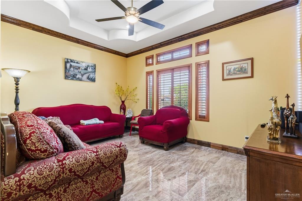 717 West 27th Street Mission, TX 78574 - Photo 7 of 18 a bedroom with furniture and a large window