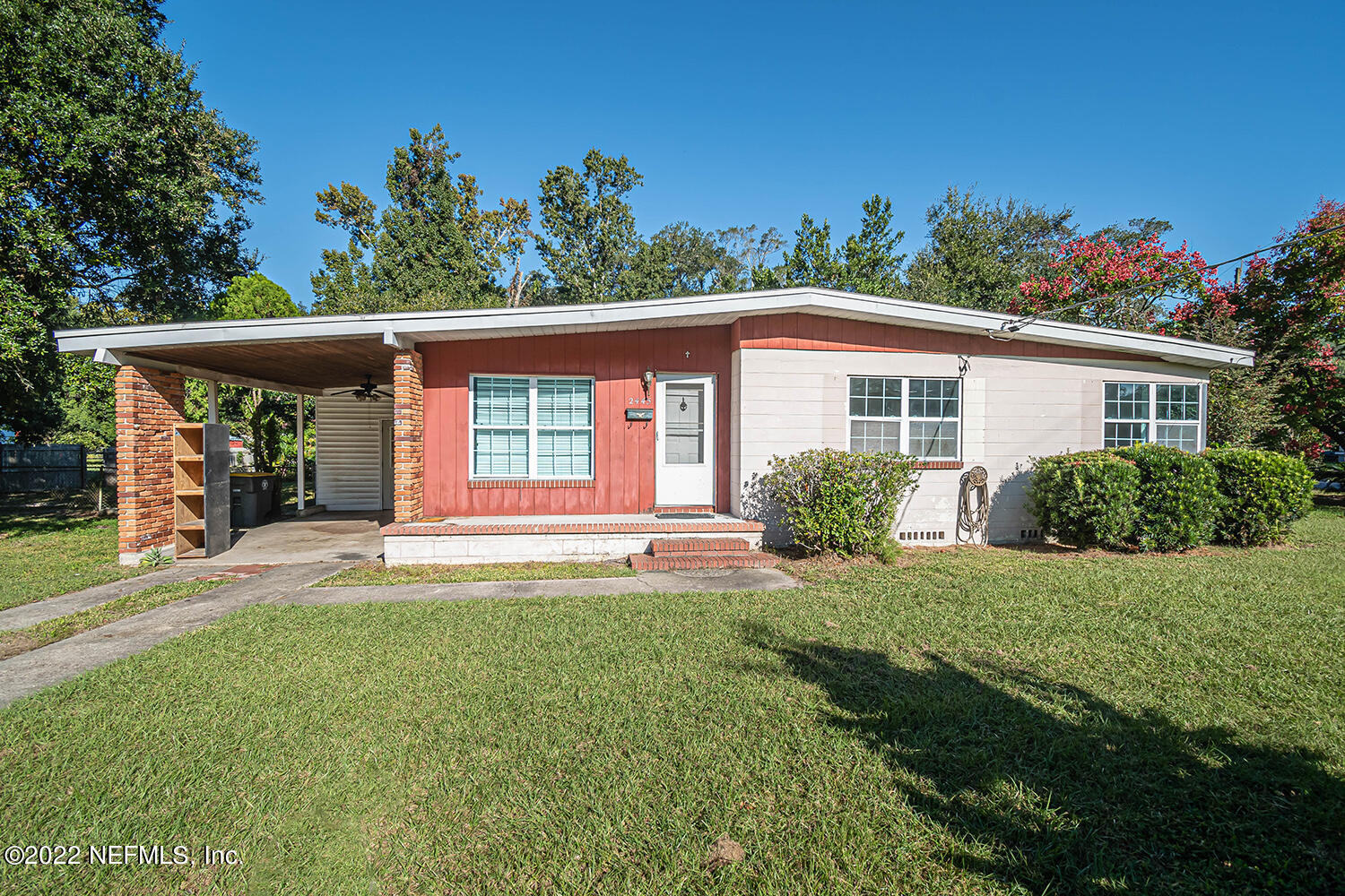 2445 Community Road Jacksonville, FL 32207 - Photo 1 of 42 a view of a house with backyard and garden