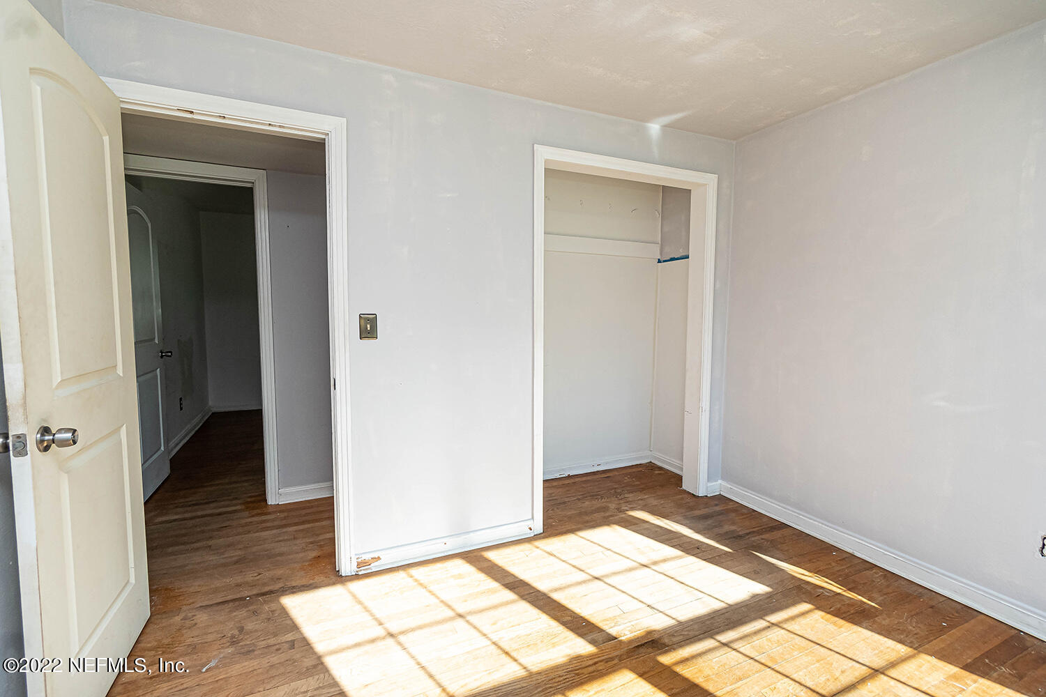 2445 Community Road Jacksonville, FL 32207 - Photo 29 of 42 a view of an empty room and wooden floor