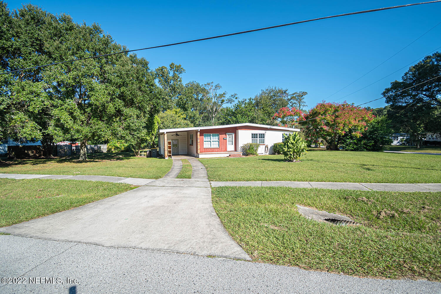 2445 Community Road Jacksonville, FL 32207 - Photo 3 of 42 a view of a house with a yard