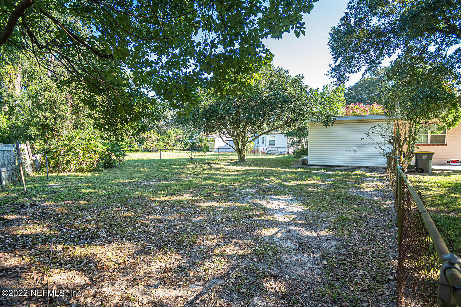 2445 Community Road Jacksonville, FL 32207 - Photo 33 of 42 a view of a tree in a yard with large tree