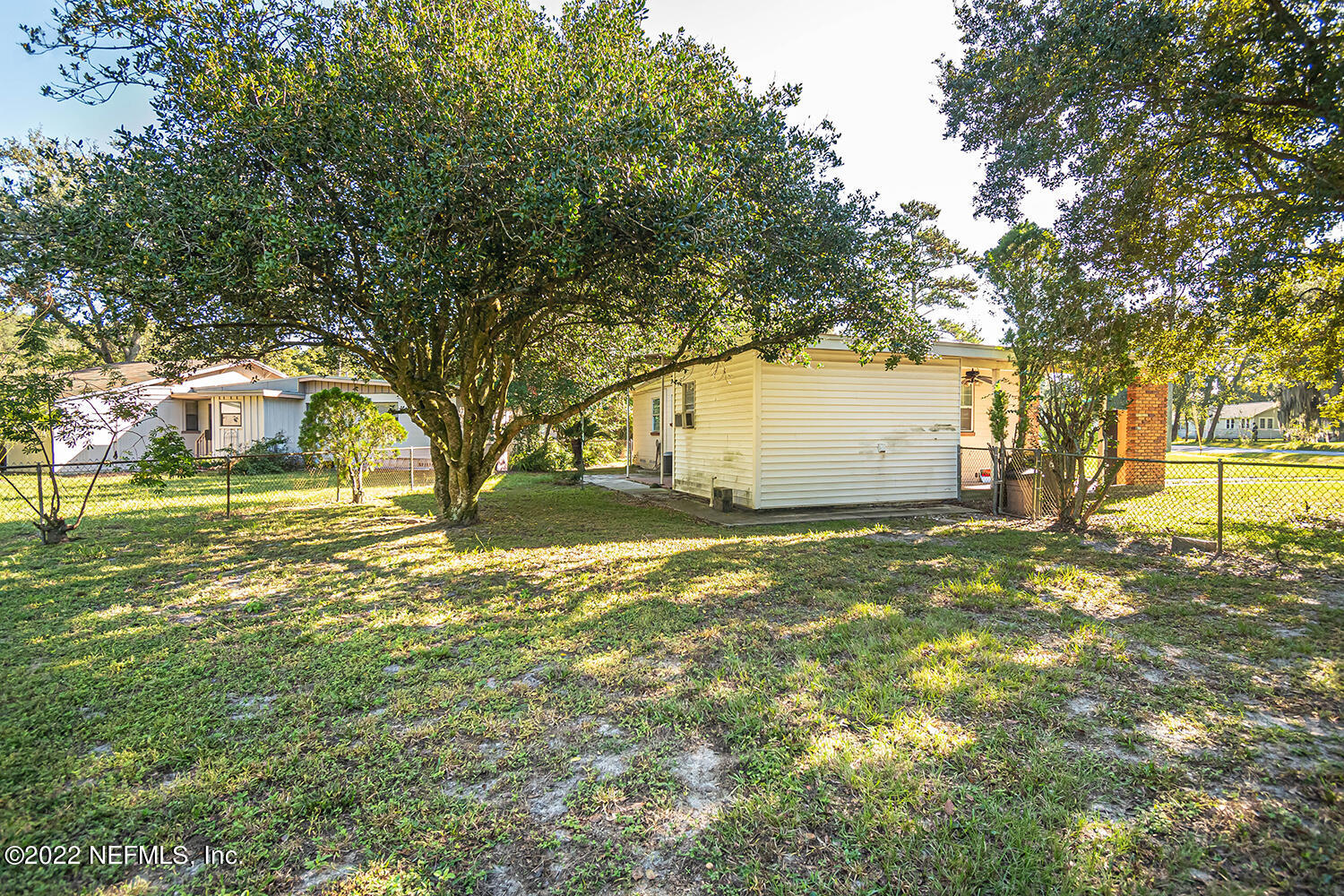 2445 Community Road Jacksonville, FL 32207 - Photo 38 of 42 a view of a house with a yard