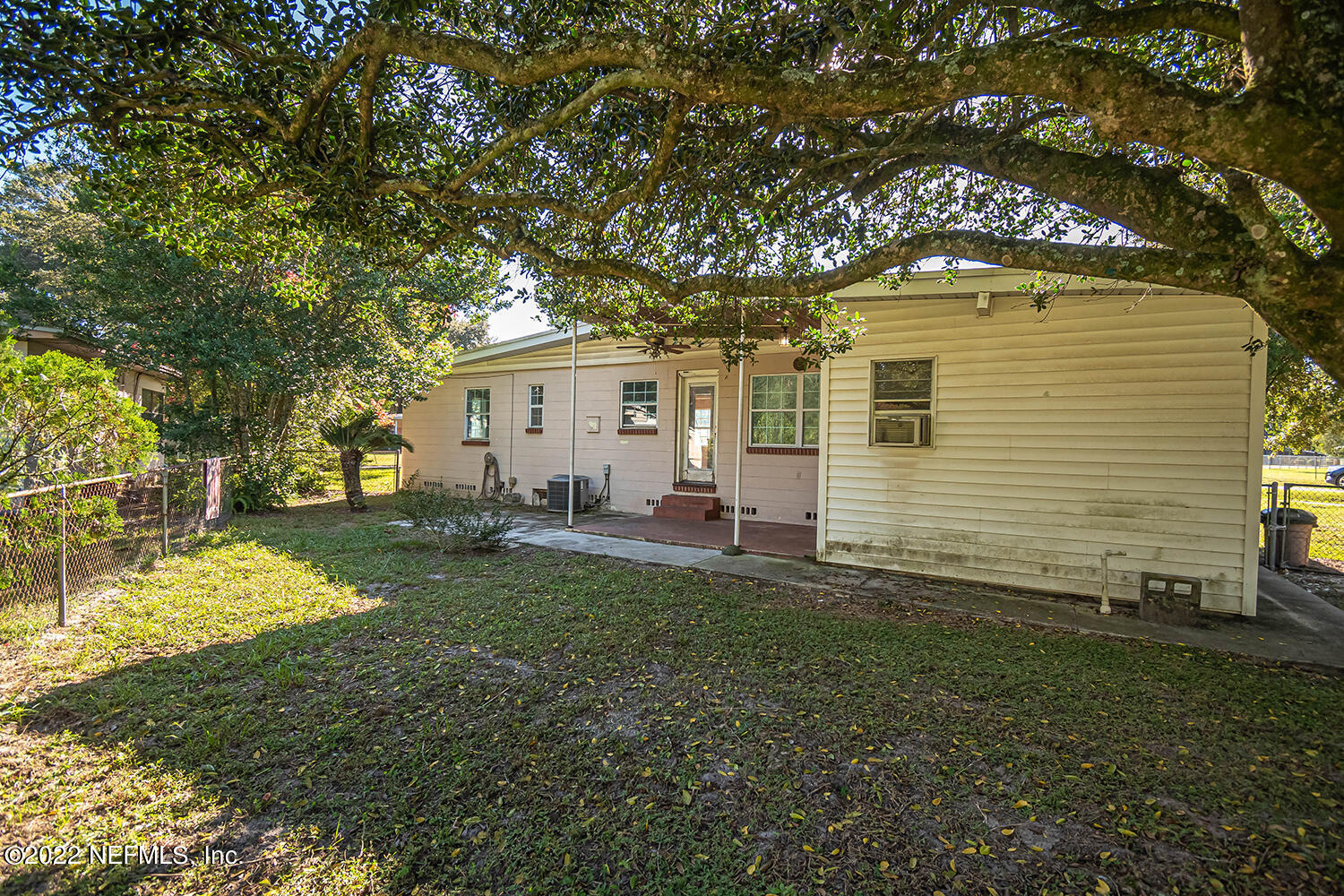 2445 Community Road Jacksonville, FL 32207 - Photo 39 of 42 a view of backyard of house with green space
