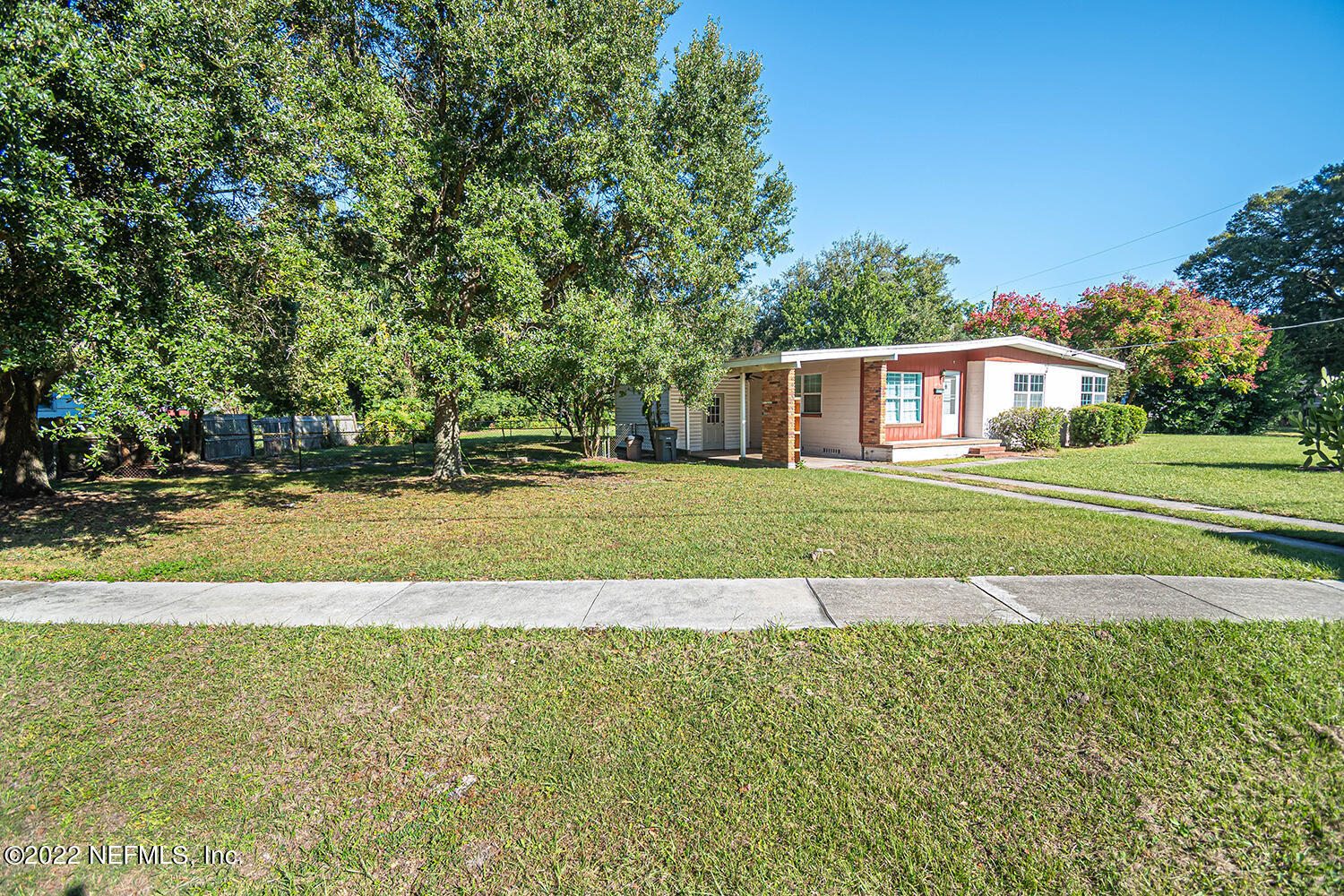 2445 Community Road Jacksonville, FL 32207 - Photo 8 of 42 a view of a house with a big yard