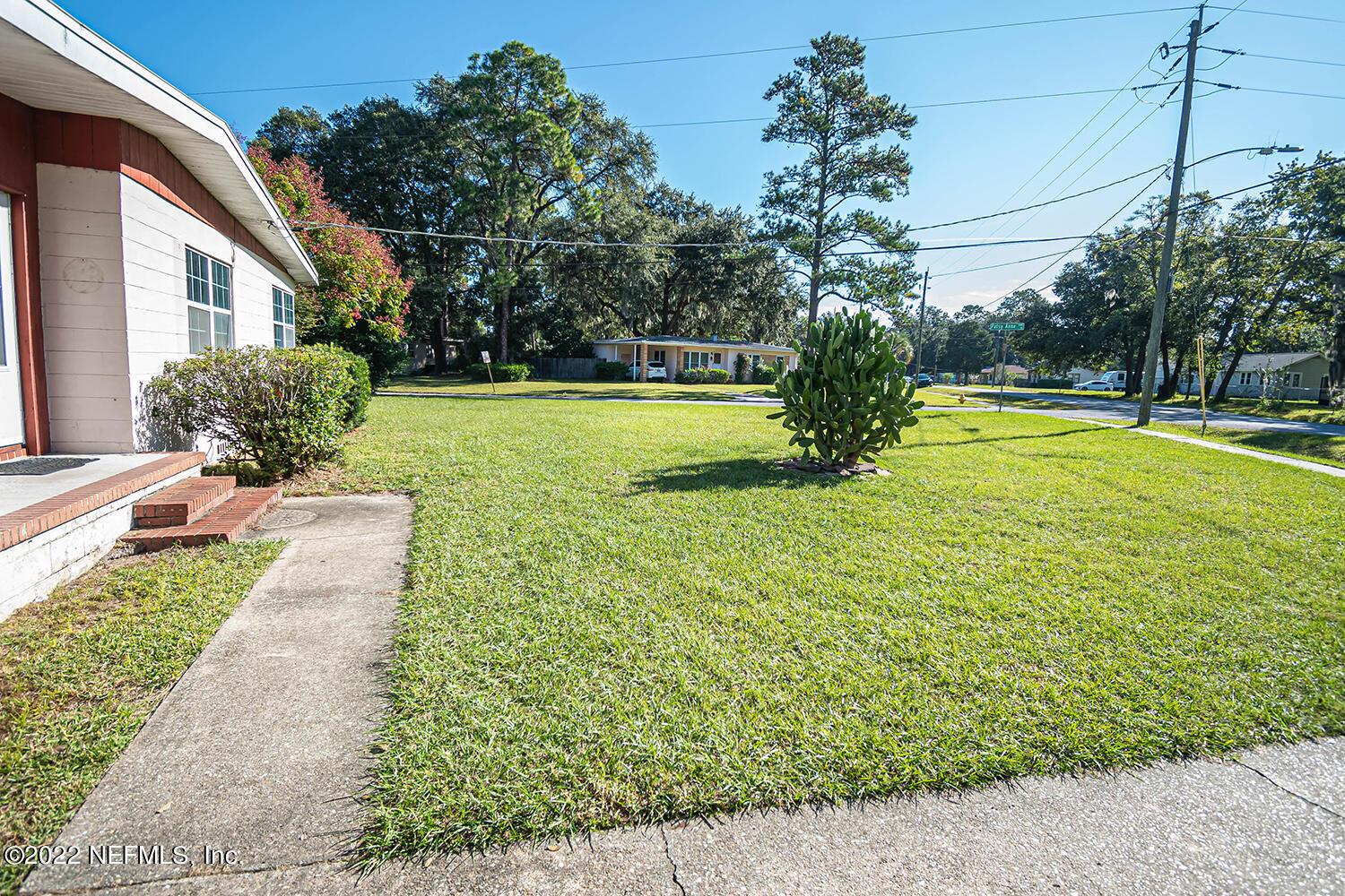 2445 Community Road Jacksonville, FL 32207 - Photo 9 of 42 a view of a house with a swimming pool