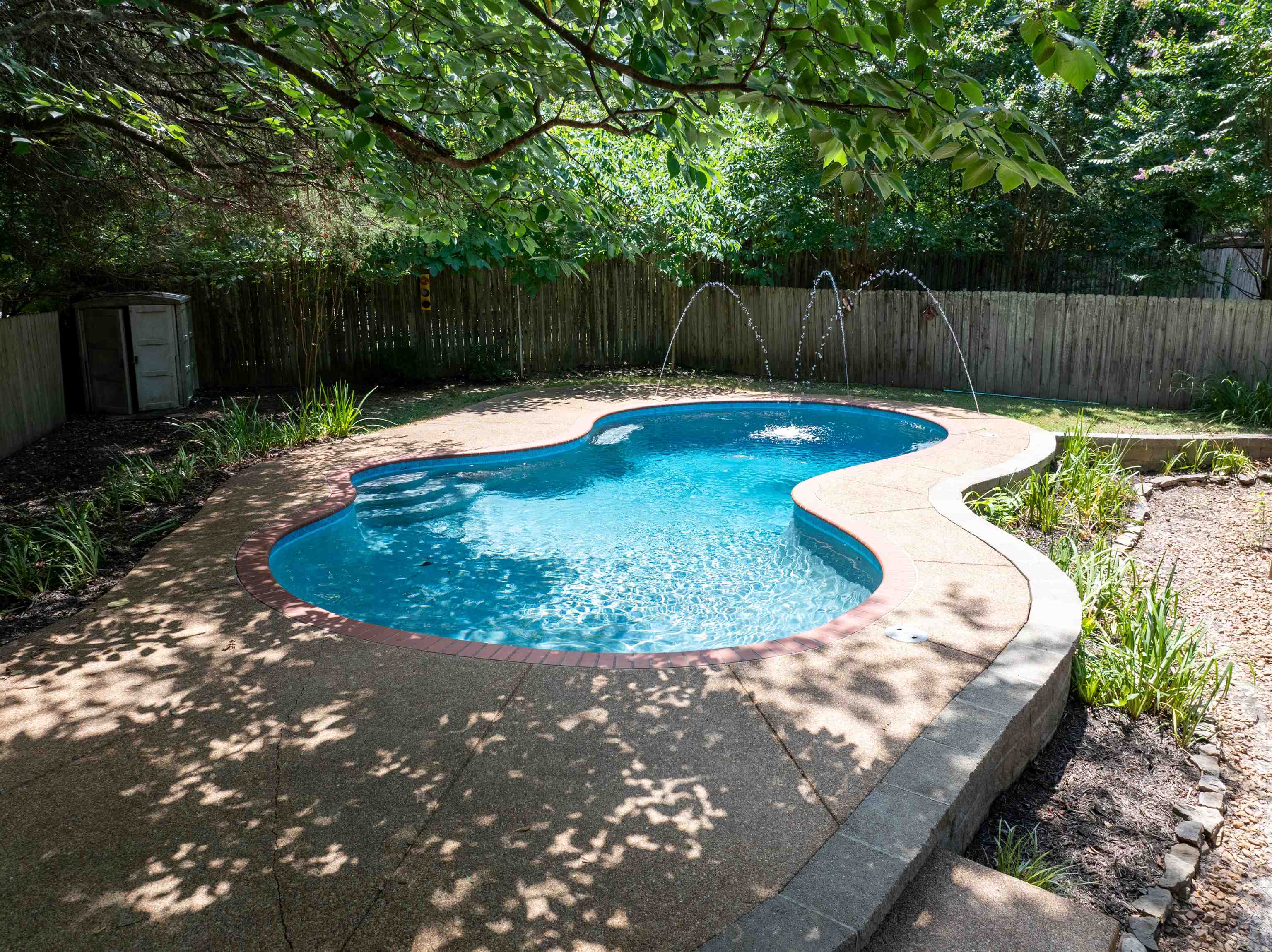 255 Ellawood Lane Collierville, TN 38017 - Photo 34 of 38 a view of a backyard