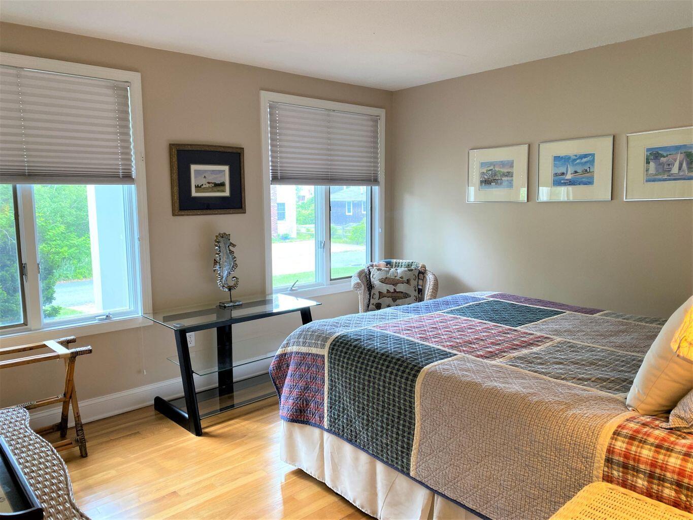 44 Island View Road Hyannis, MA 02601 - Photo 16 of 33 a bedroom with a bed and a window