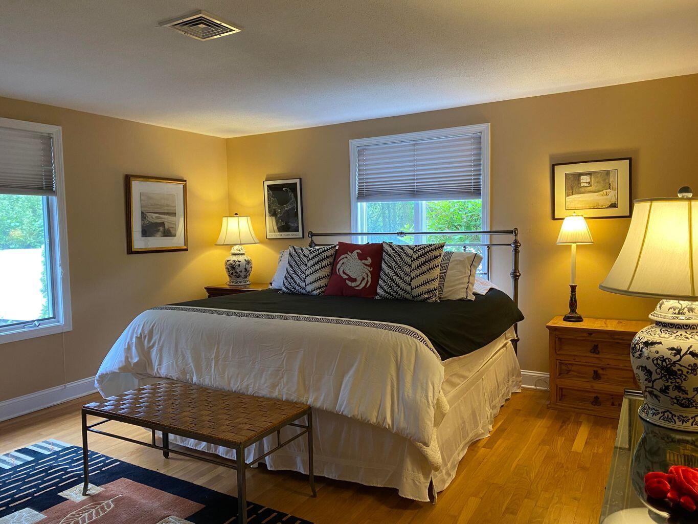 44 Island View Road Hyannis, MA 02601 - Photo 20 of 33 a bedroom with a bed and wooden floor