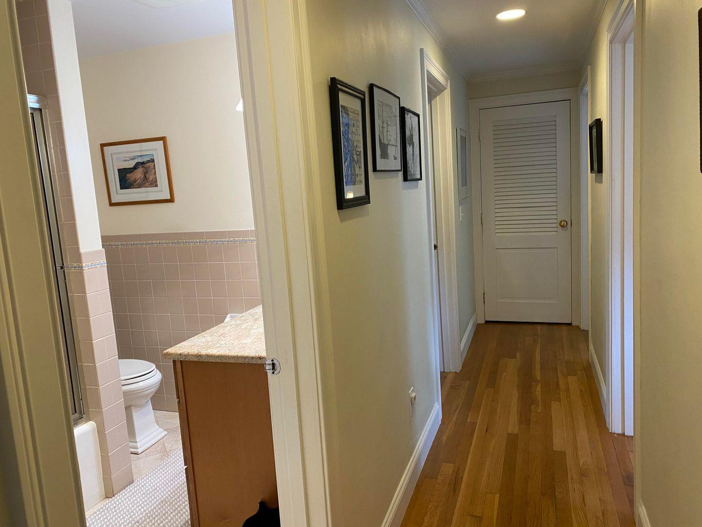 44 Island View Road Hyannis, MA 02601 - Photo 21 of 33 a view of a hallway with wooden floor and bathroom