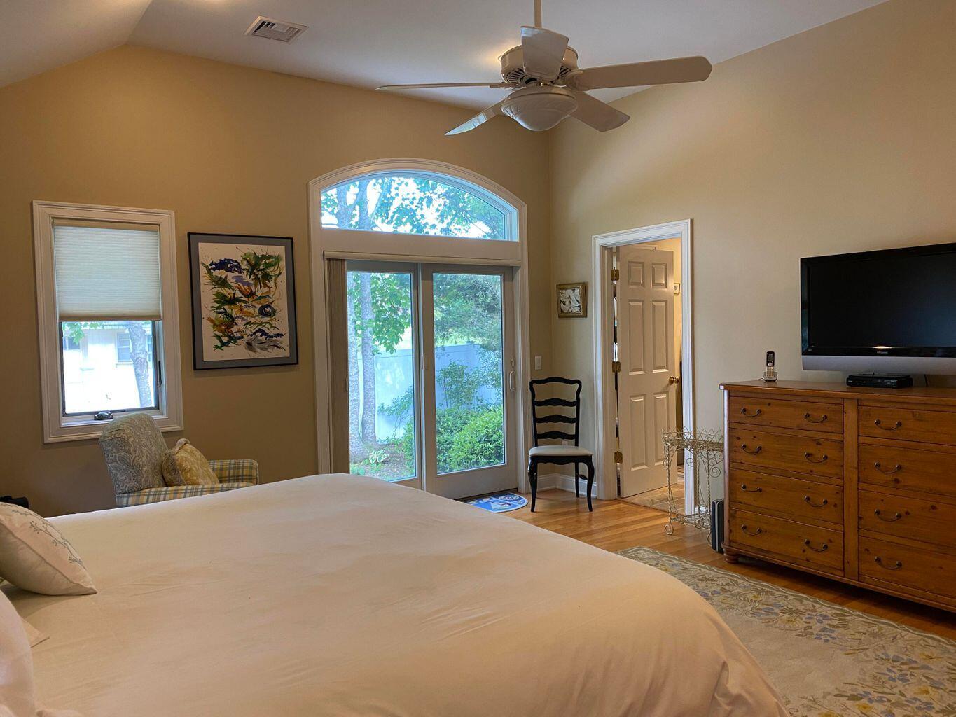 44 Island View Road Hyannis, MA 02601 - Photo 23 of 33 a bedroom with a bed and a flat screen tv