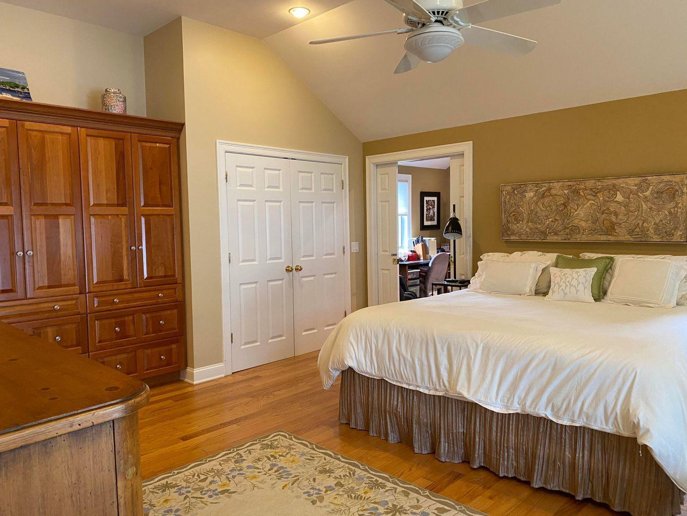 44 Island View Road Hyannis, MA 02601 - Photo 27 of 33 a bedroom with a bed and a dresser