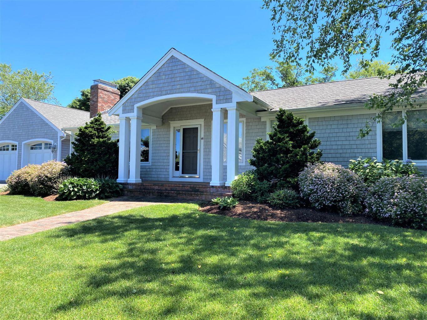 44 Island View Road Hyannis, MA 02601 - Photo 3 of 33 a front view of a house with a garden