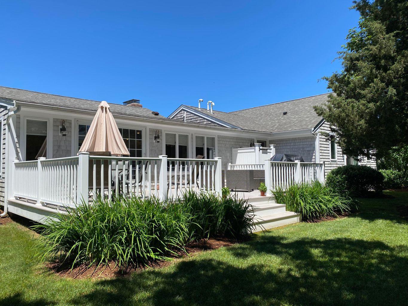 44 Island View Road Hyannis, MA 02601 - Photo 4 of 33 a view of a yard in front of house