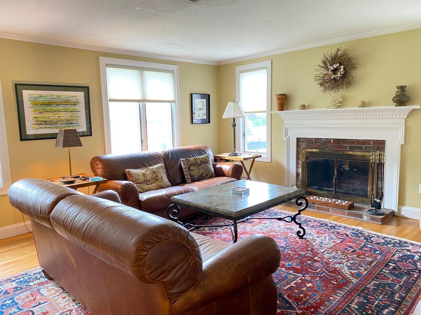 44 Island View Road Hyannis, MA 02601 - Photo 6 of 33 a living room with furniture a fireplace and next to a window