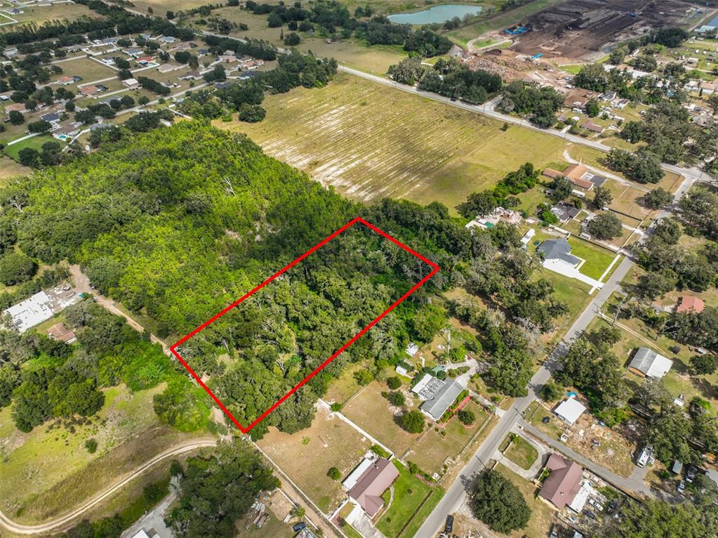 Stark Road Seffner, FL 33584 - Photo 14 of 19 an aerial view of a residential houses with yard