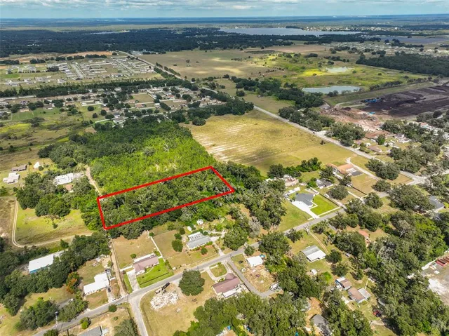 a view of swimming pool with a yard