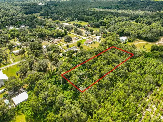 a view of a large body of water with a house