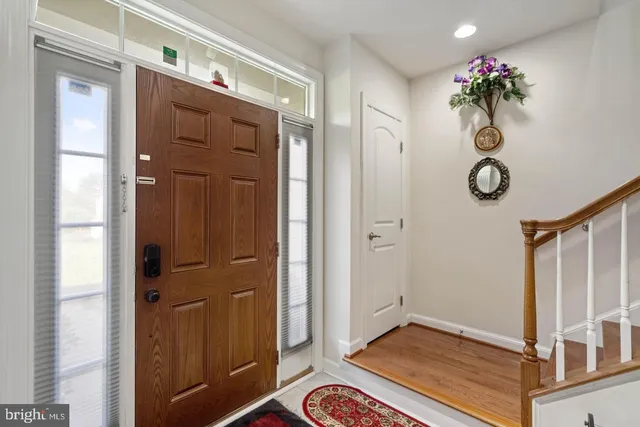 a view of an entryway with a chandelier