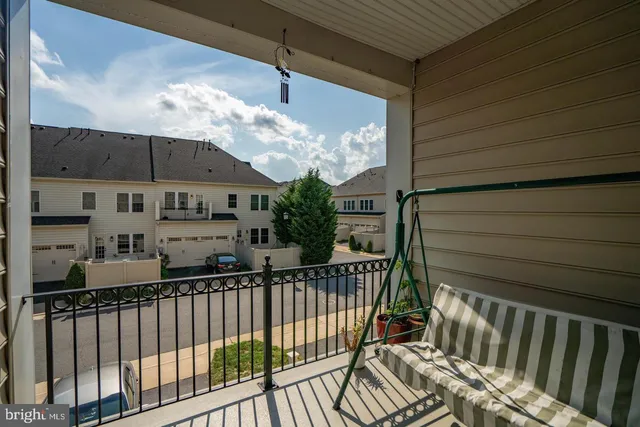 a view of a porch with furniture