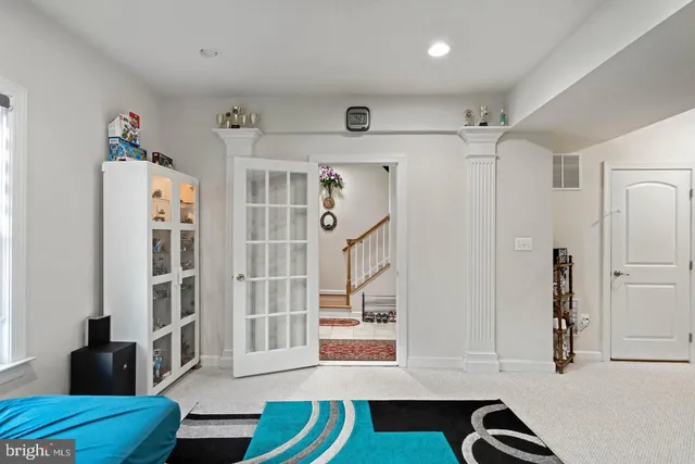 a view of kitchen with furniture and wooden floor