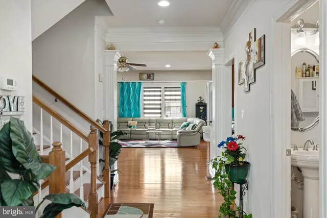 a lobby with furniture and flowers