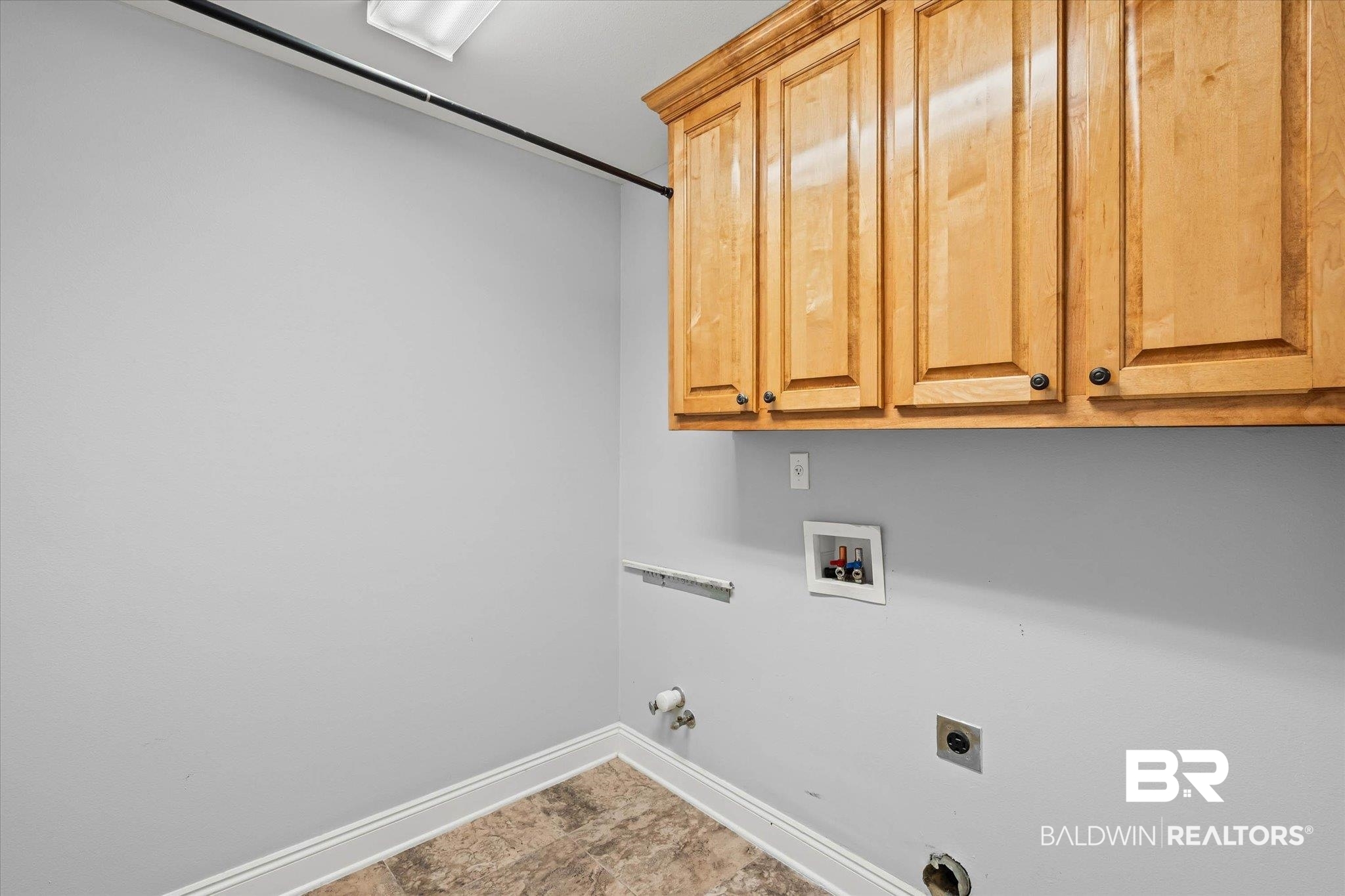 704 Edinburgh Avenue Foley, AL 36535 - Photo 27 of 32 Laundry area with hookup for a washing machine, gas dryer hookup, cabinet space, and electric dryer hookup