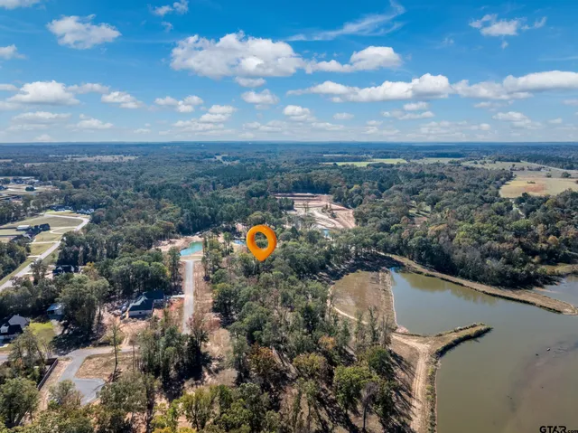 a view of a lake in middle of a city