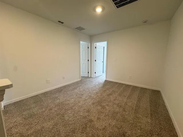 an empty room with an entryway