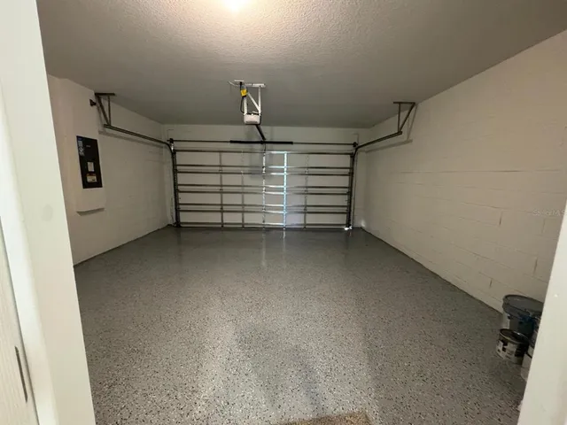 a view of empty room with stairs