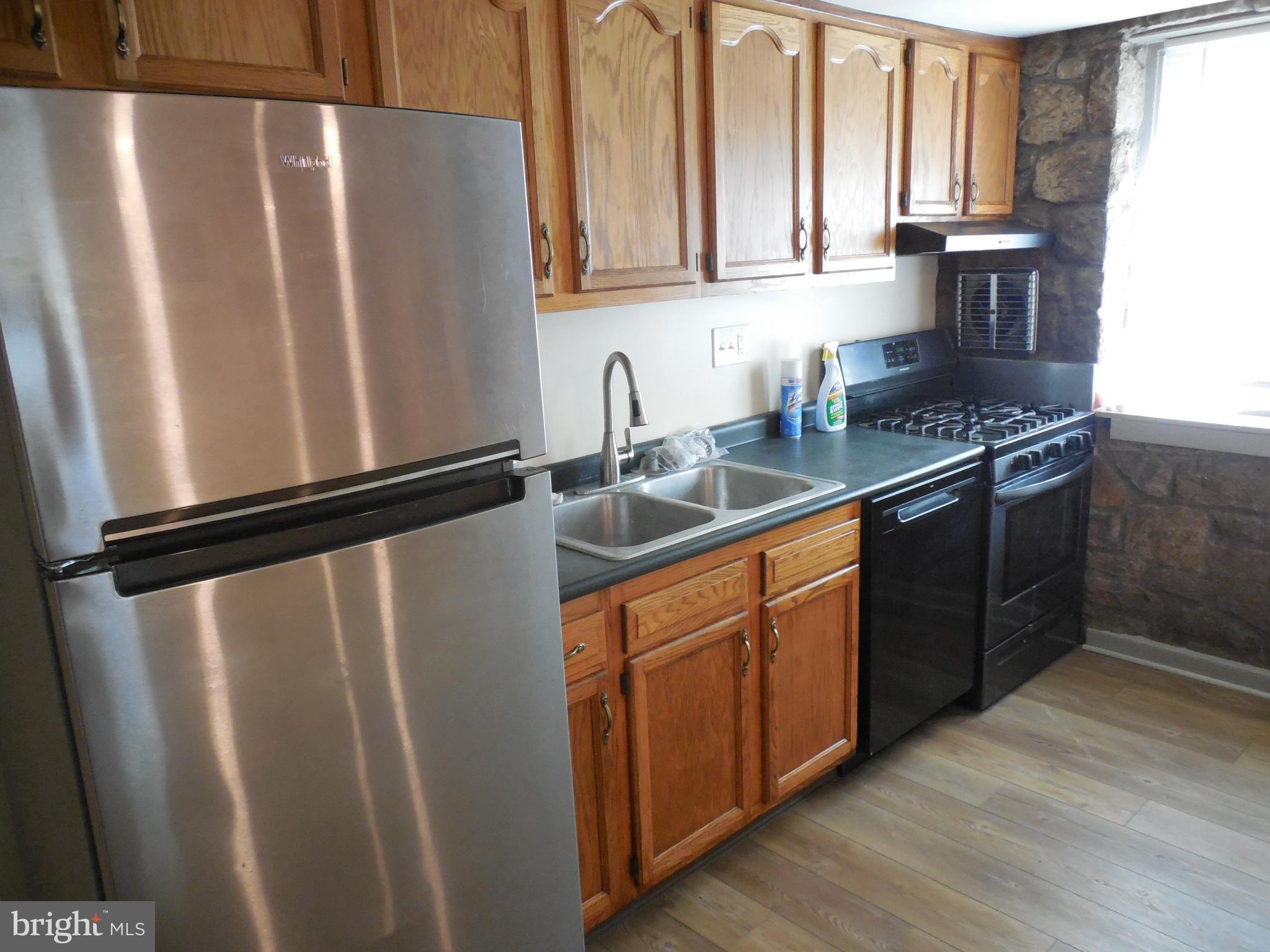 20 Camp Rock Hill Road Quakertown, PA 18951 - Photo 12 of 27 a kitchen with stainless steel appliances granite countertop a refrigerator and a sink