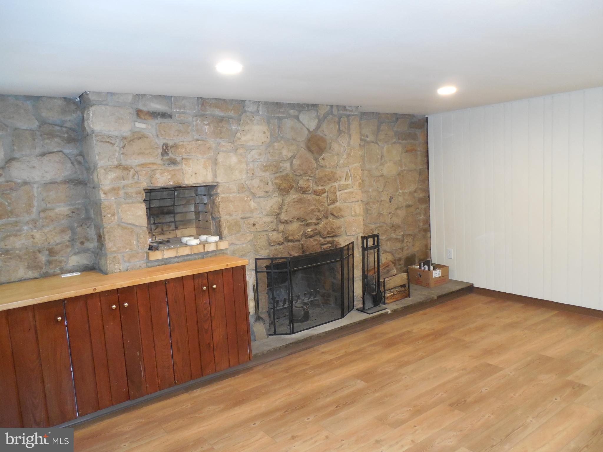 20 Camp Rock Hill Road Quakertown, PA 18951 - Photo 16 of 27 a hallway with a fireplace in it