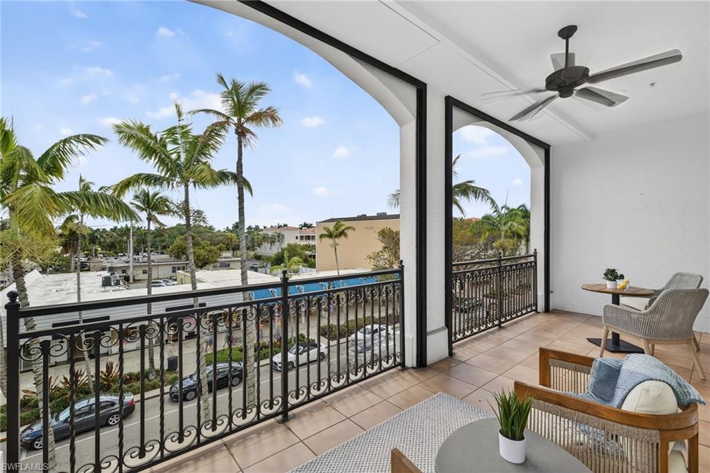 625 5th Avenue South, Unit PH302 Naples, FL 34102 - Photo 14 of 33 Balcony featuring a ceiling fan