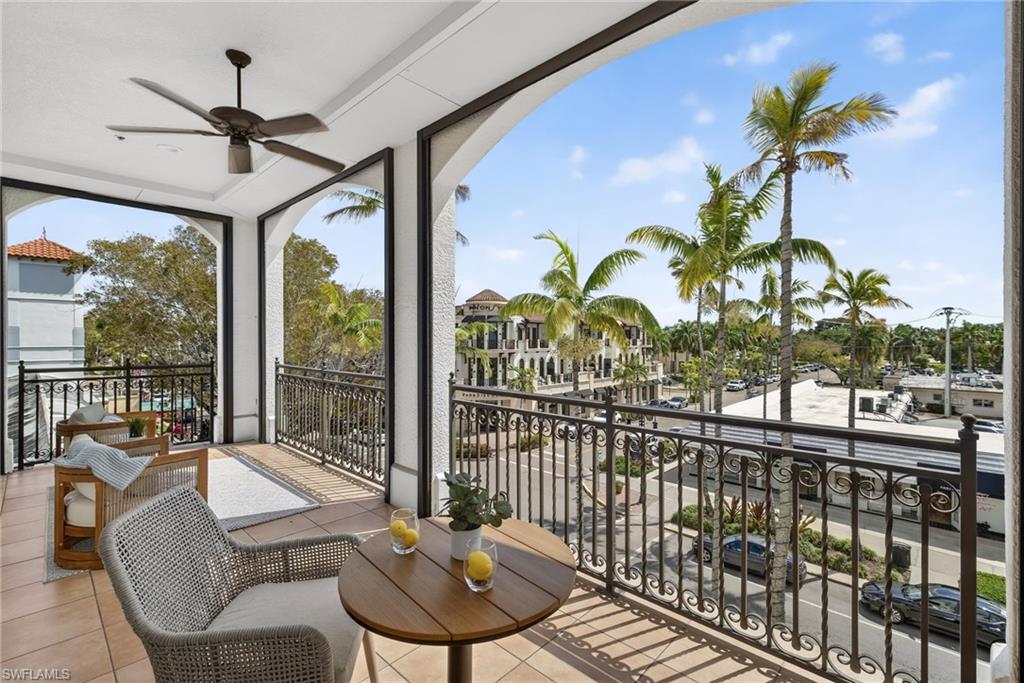 625 5th Avenue South, Unit PH302 Naples, FL 34102 - Photo 15 of 33 Balcony featuring ceiling fan