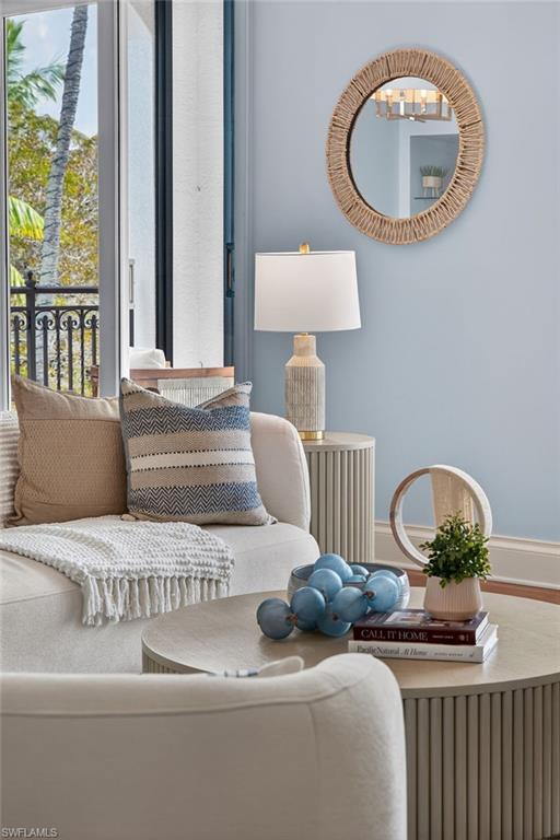 625 5th Avenue South, Unit PH302 Naples, FL 34102 - Photo 26 of 33 Living area featuring radiator and baseboards