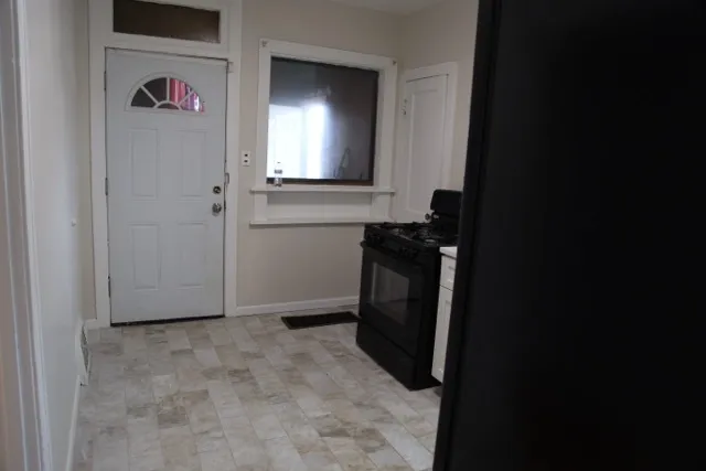 a view of a hallway and a sink