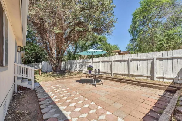 a view of swimming pool with chairs