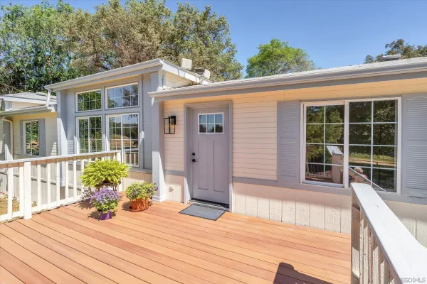 a front view of a house with a porch