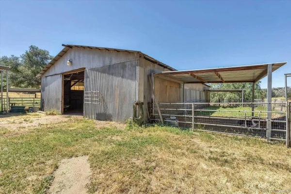 a view of a room with wooden walls