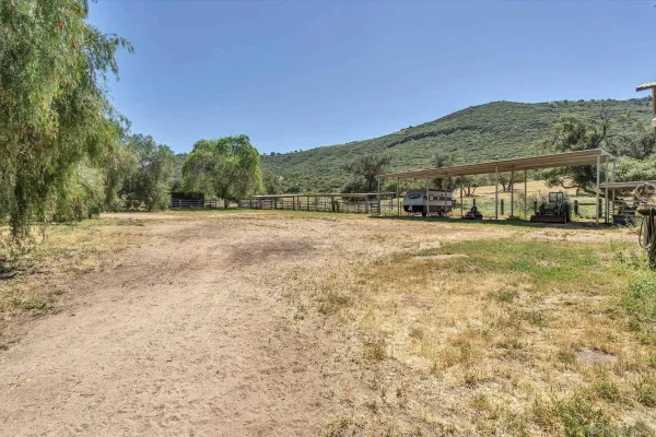a view of a lake with a building in the background