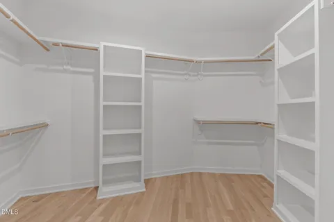 a view of an empty walk in closet