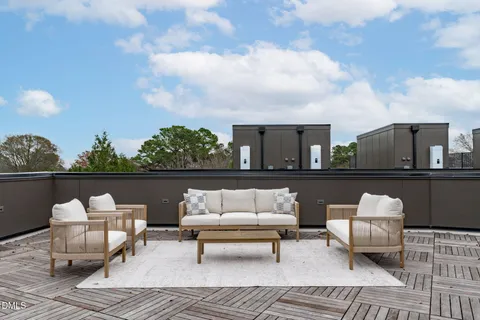 a view of a terrace with furniture