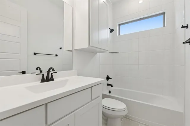 a large kitchen with cabinets