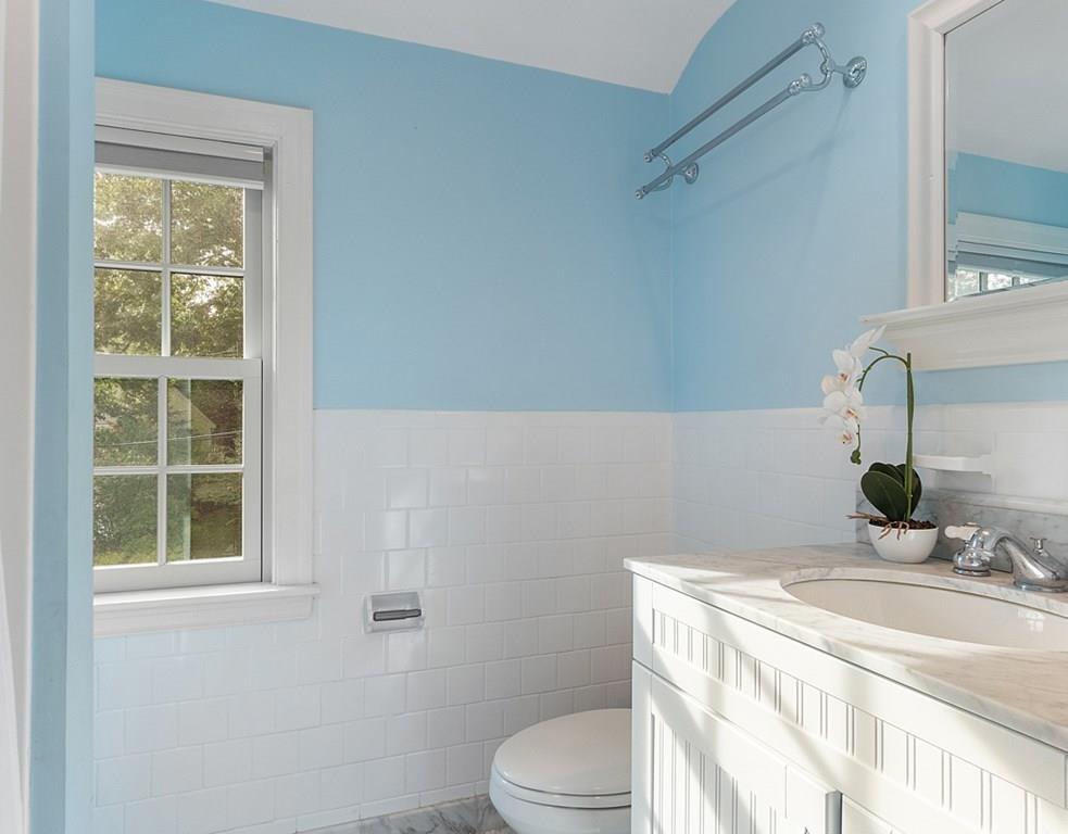 9 Northgate Road Wellesley, MA 02481 - Photo 25 of 32 a bathroom with a sink toilet and window
